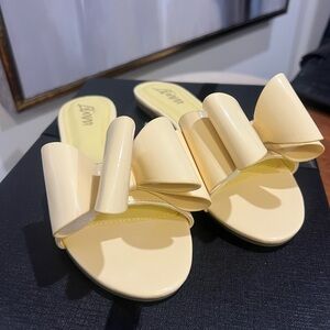 Patent Bow Slide Sandals in Pale Yellow - Women